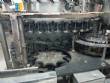 CompoMaq rotary filling machine with 42 nozzles and screw capper