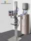 Liquid and viscous products packaging machine