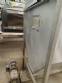 Stainless steel bagging storage silo with screw conveyor outlet