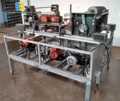 Creaming, filling, forming and pressing machine for wafer sheets.