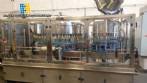 Rotary packer with 50 nozzles and 18 wrapping machines IMSB