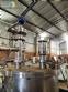 Stainless steel filling machine for beer liquids in Brabeer bottles