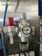 Stainless steel filling machine for beer liquids in Brabeer bottles