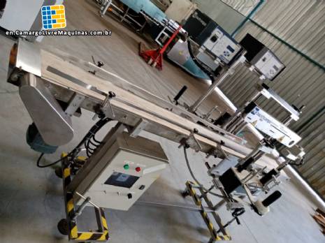 Automatic labeling machine for flat products Automatic labeling machine for flat products