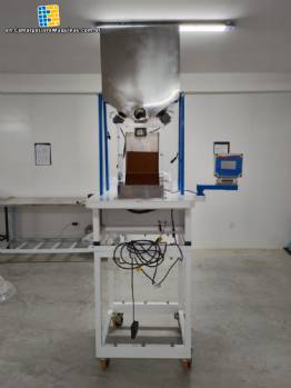 JHM Maximatic powder dosing, weighing, filling and packaging machine for 150 to 1000 grams. JHM Maximatic powder dosing, weighing, filling and packaging machine for 150 to 1000 grams.