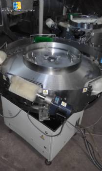 Rotary feeder of bullets and chewing gum type Flow Pack machines Rotary feeder of bullets and chewing gum type Flow Pack machines